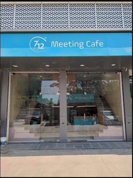 7/12 Meeting Café storefront in daylight